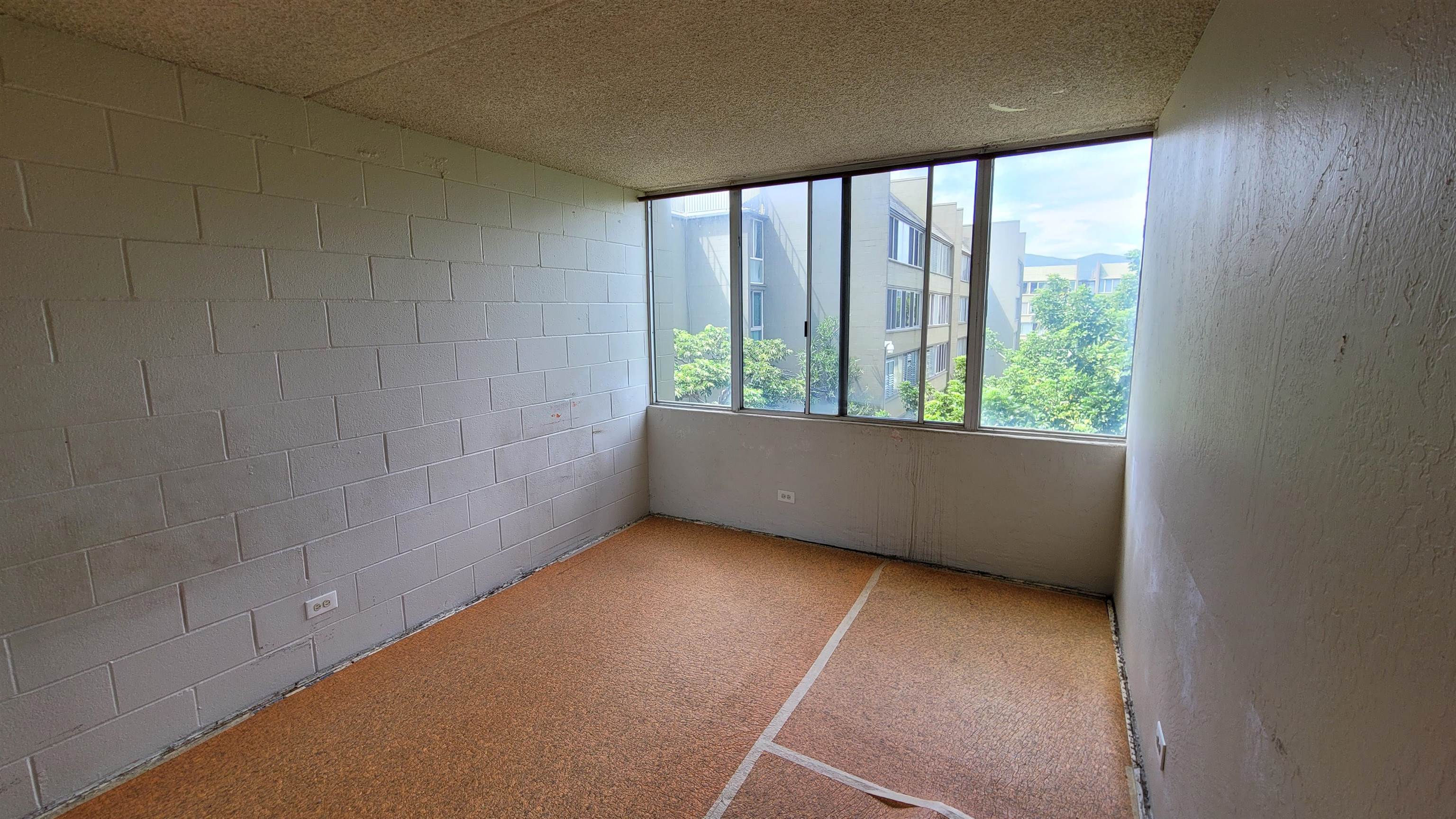 111 Kahului Beach Road, Unit B301 Kahului, HI 96732 - Photo 7 of 20 a view of an empty room with a window