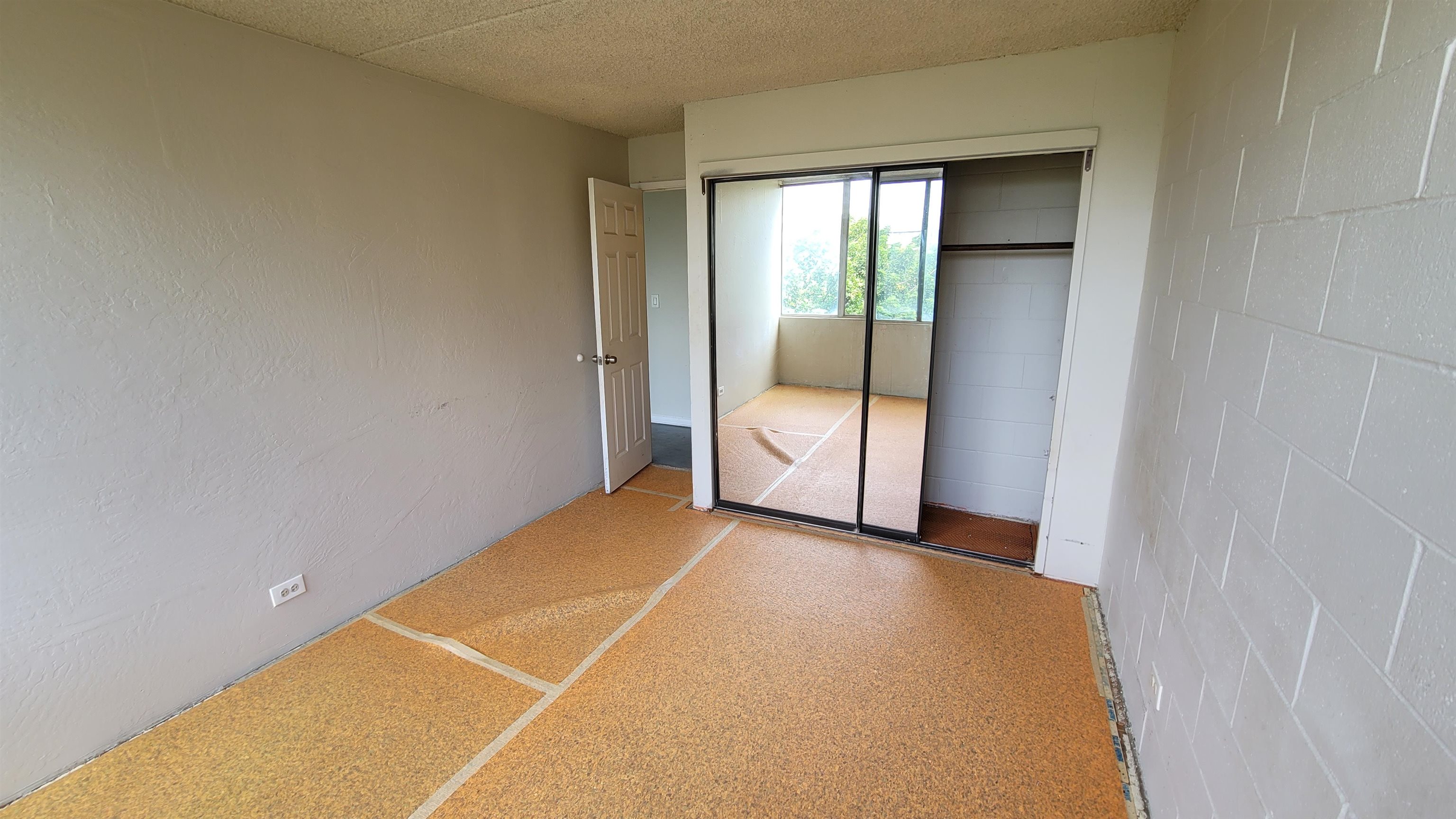111 Kahului Beach Road, Unit B301 Kahului, HI 96732 - Photo 9 of 20 a view of an empty room and a window