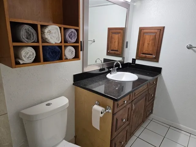 a bathroom with a toilet and sink