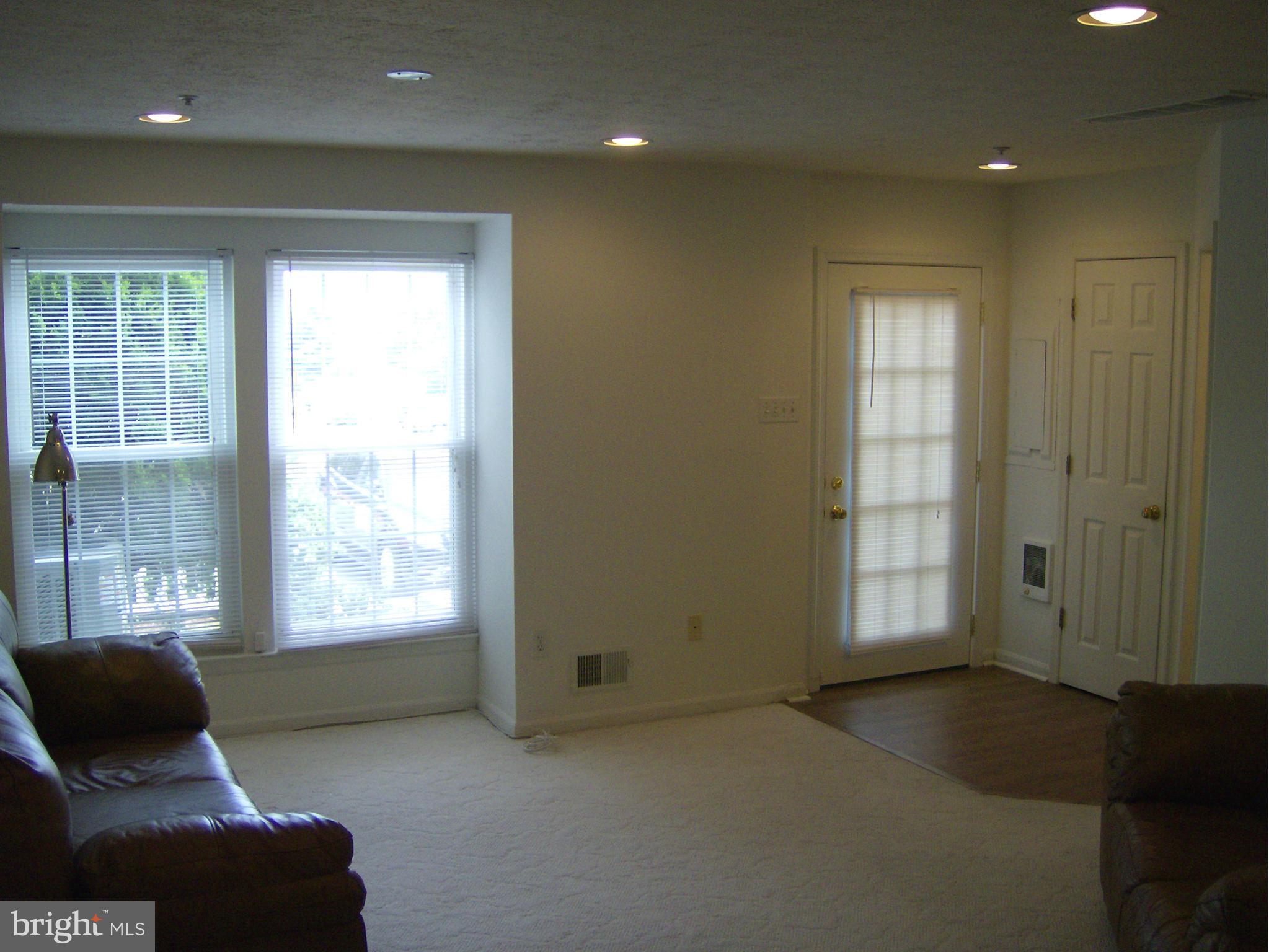4230 Maple Path Circle, Unit 19 Nottingham, MD 21236 - Photo 2 of 19 a living room with furniture and a window