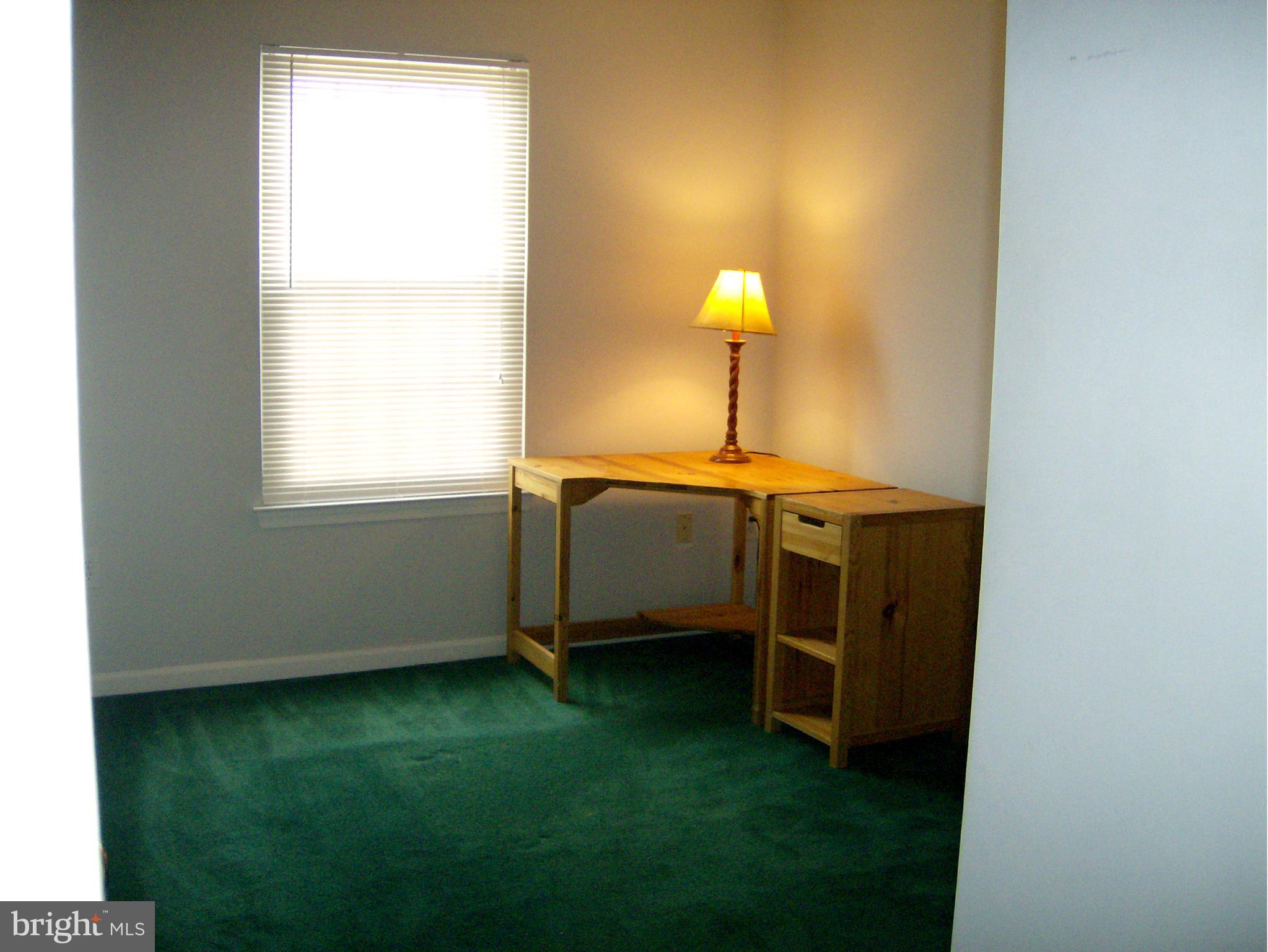 4230 Maple Path Circle, Unit 19 Nottingham, MD 21236 - Photo 13 of 19 a view of an empty room with a window