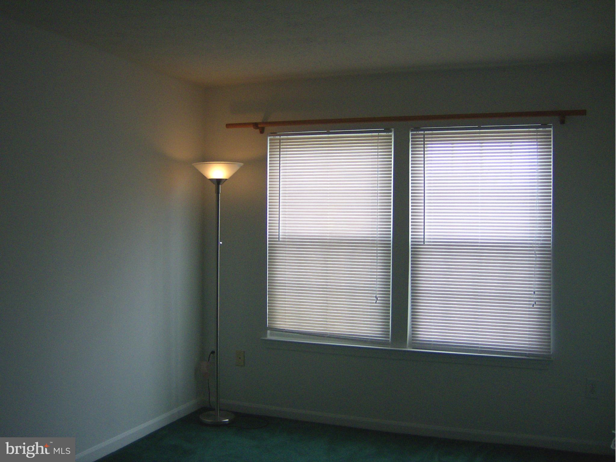 4230 Maple Path Circle, Unit 19 Nottingham, MD 21236 - Photo 14 of 19 a view of an empty room with a window