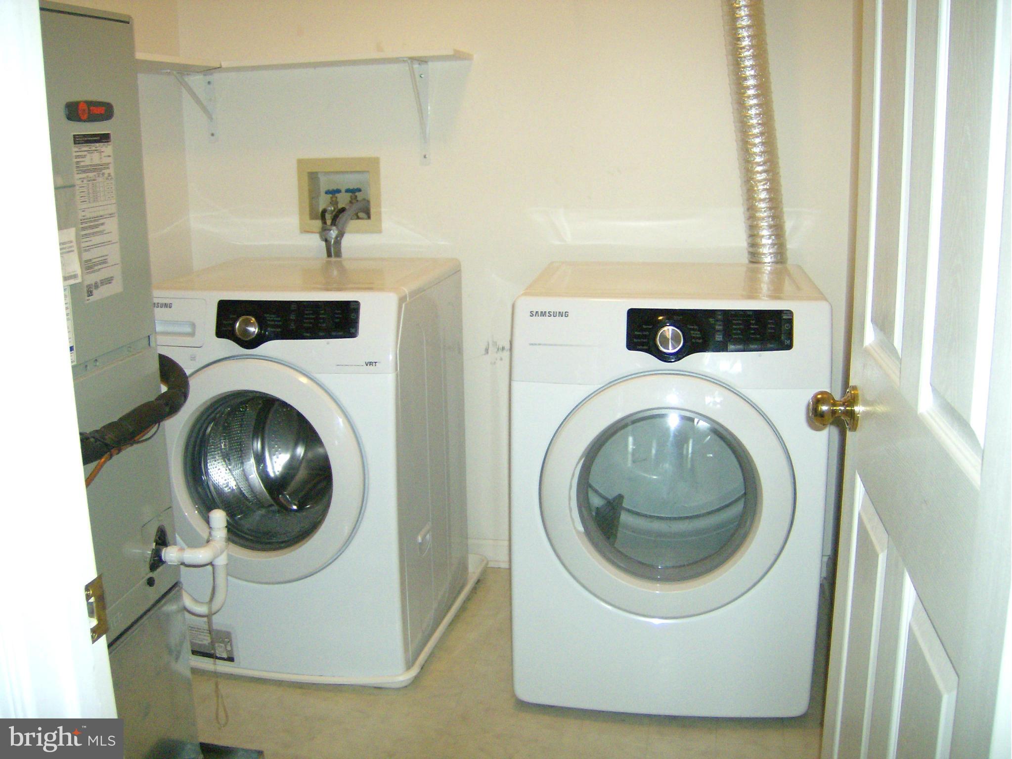 4230 Maple Path Circle, Unit 19 Nottingham, MD 21236 - Photo 17 of 19 a utility room with dryer and washer