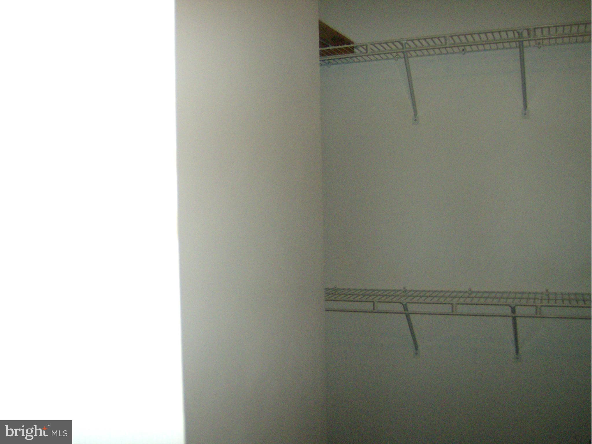 4230 Maple Path Circle, Unit 19 Nottingham, MD 21236 - Photo 19 of 19 a view of a room with racks on the wall