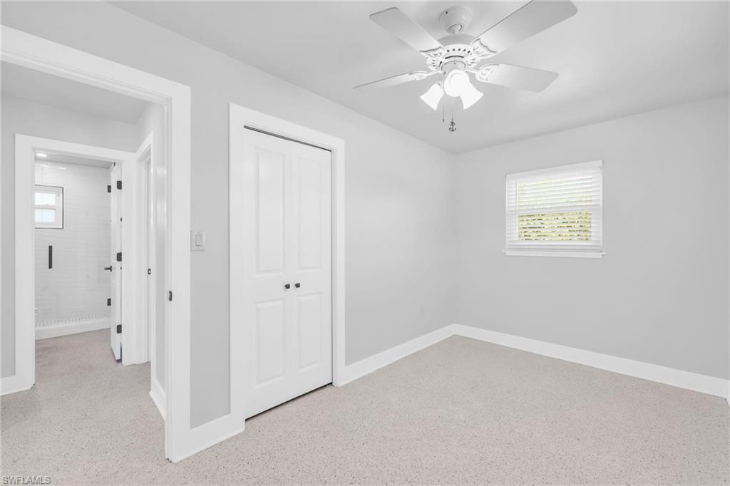 2822 Bruce Street Matlacha, FL 33993 - Photo 19 of 26 a view of an empty room with a window