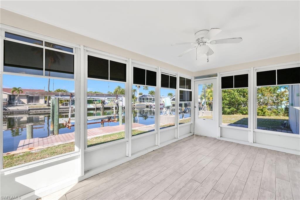 2822 Bruce Street Matlacha, FL 33993 - Photo 24 of 26 a view interior of a house wooden floor and windows