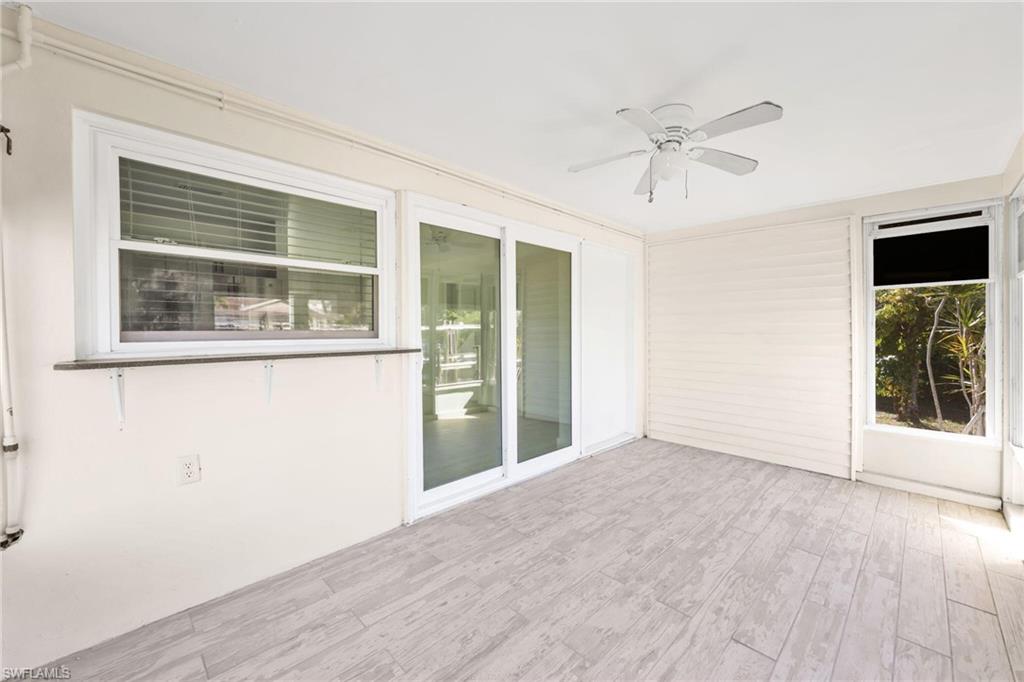 2822 Bruce Street Matlacha, FL 33993 - Photo 25 of 26 a view of an empty room with a window and wooden floor
