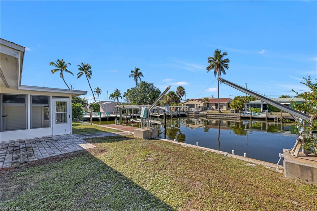 2822 Bruce Street Matlacha, FL 33993 - Photo 4 of 26 a view of a house with a yard