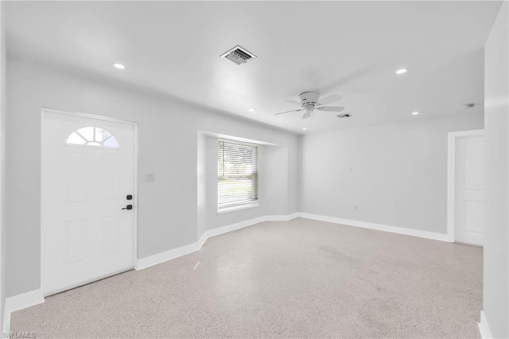 2822 Bruce Street Matlacha, FL 33993 - Photo 10 of 26 a view of an empty room with a window