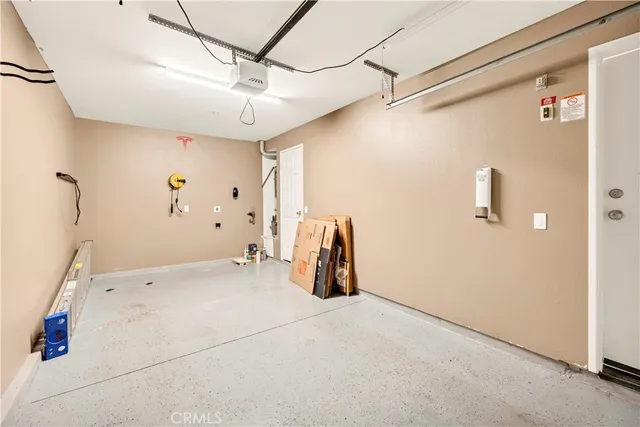 a view of a storage and utility room with closet
