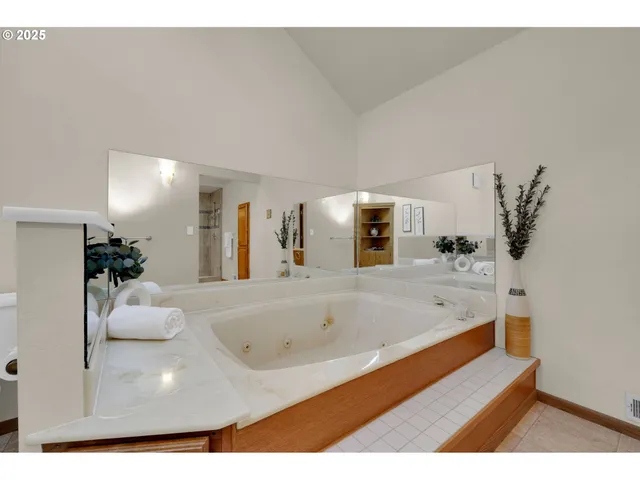 a view of house with a big yard