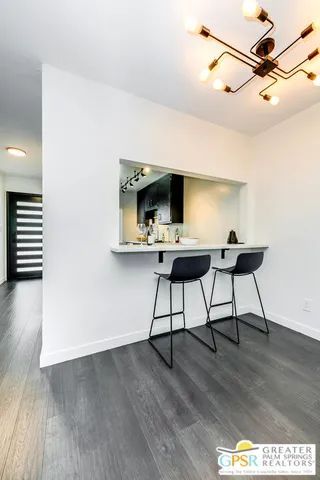 a workspace with furniture and wooden floor