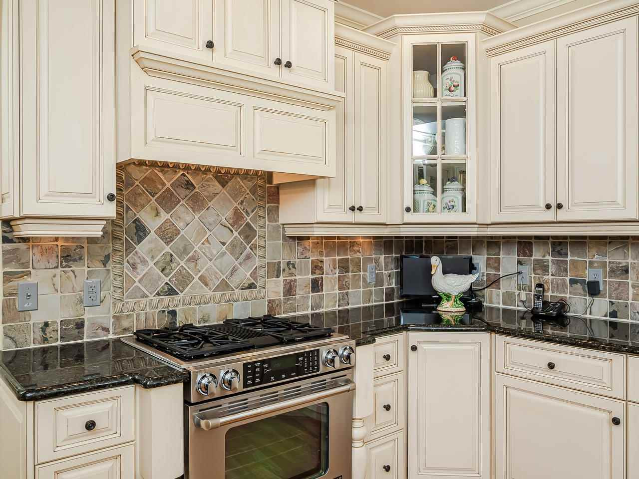 7220 Donneeford Road Wake Forest, NC 27587 - Photo 9 of 30 The tile to this home is just remarkable. Kitchen