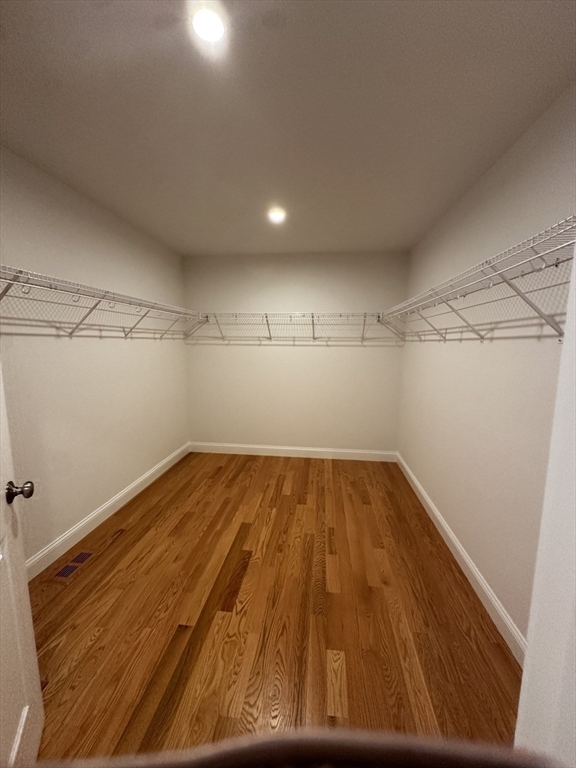 56 Dudley Road Billerica, MA 01821 - Photo 18 of 29 a view of a room with wooden floor