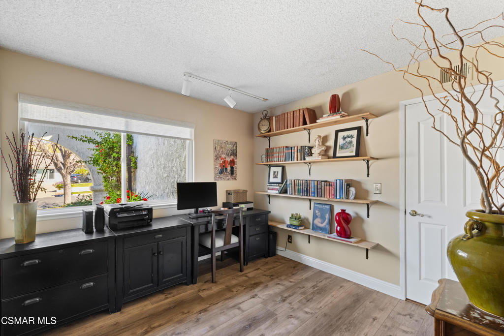 5914 Cochran Street Simi Valley, CA 93063 - Photo 15 of 23 a livingroom with workspace and a window