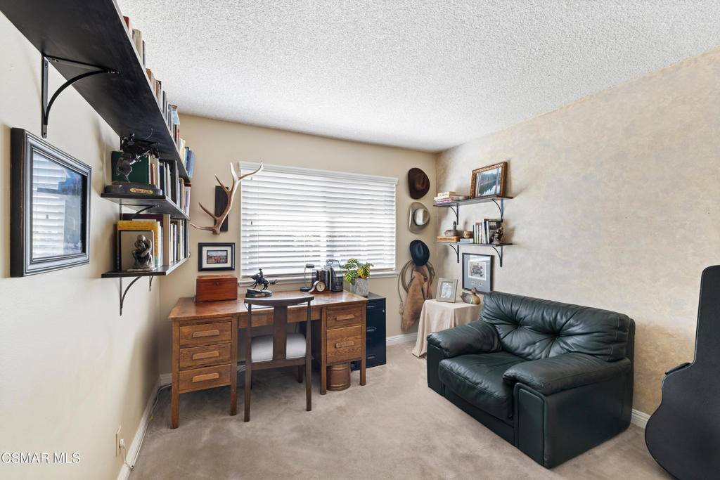 5914 Cochran Street Simi Valley, CA 93063 - Photo 18 of 23 a living room with furniture and a window