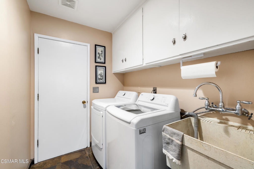 5914 Cochran Street Simi Valley, CA 93063 - Photo 19 of 23 a utility room with sink dryer and washer