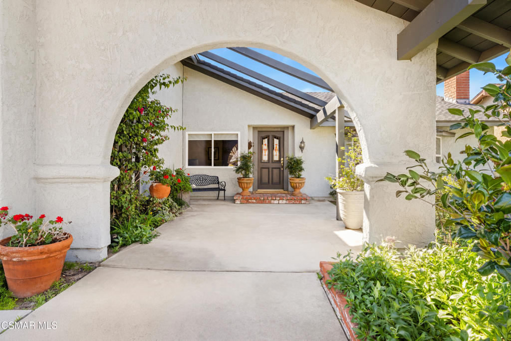 5914 Cochran Street Simi Valley, CA 93063 - Photo 3 of 23 a view of living room filled with furniture and flowers