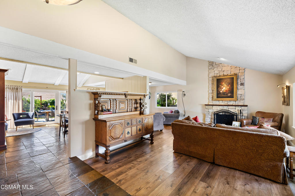 5914 Cochran Street Simi Valley, CA 93063 - Photo 5 of 23 a living room with furniture and a flat screen tv