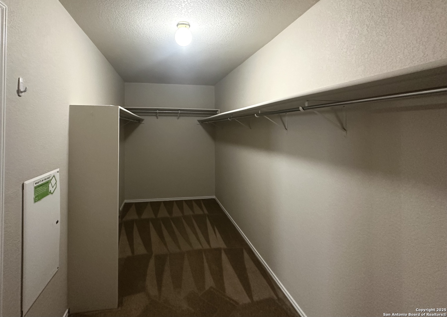 6741 Wayman Ridge Live Oak, TX 78233 - Photo 14 of 25 a view of walk in closet with clothes