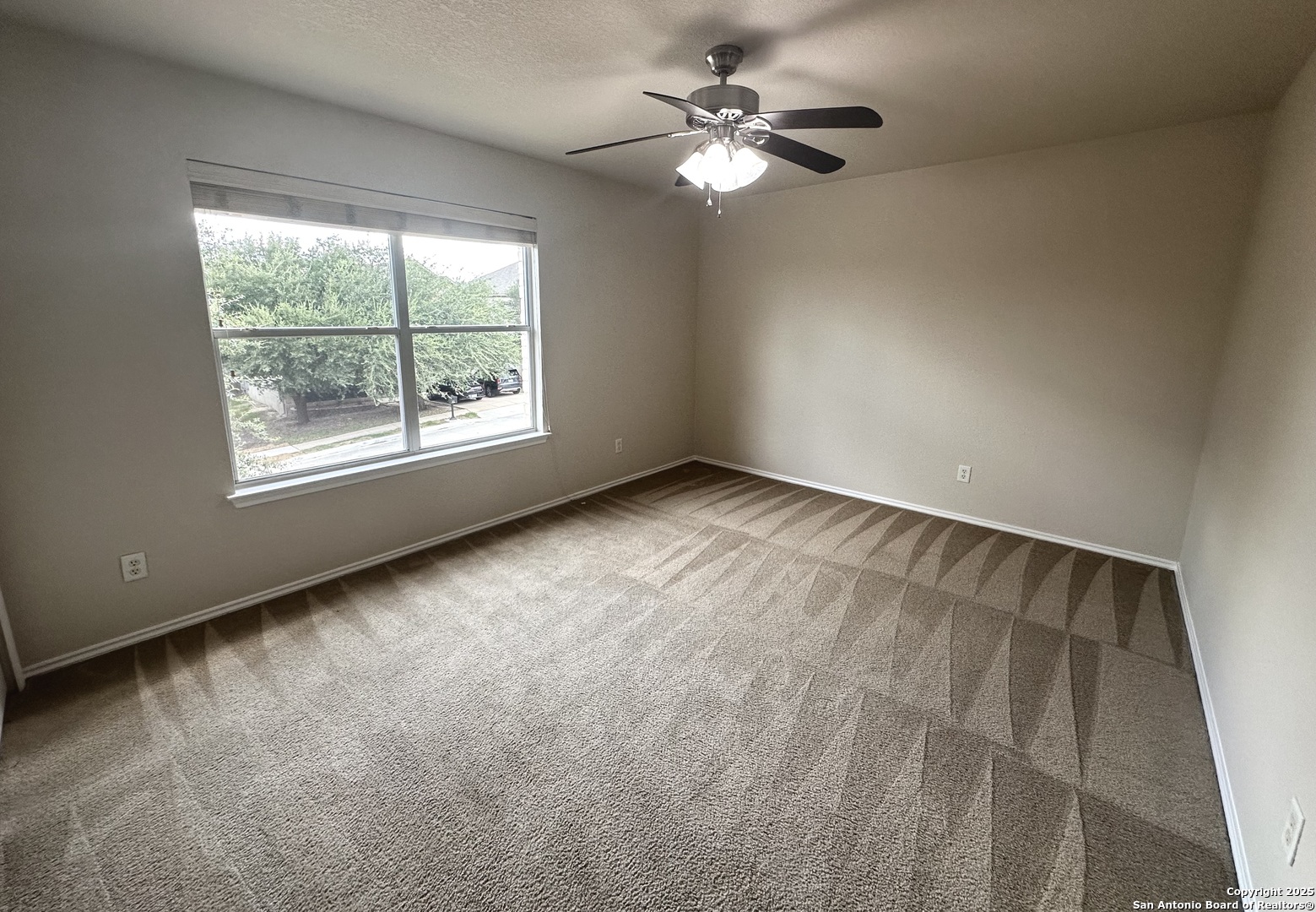 6741 Wayman Ridge Live Oak, TX 78233 - Photo 15 of 25 an empty room with a window