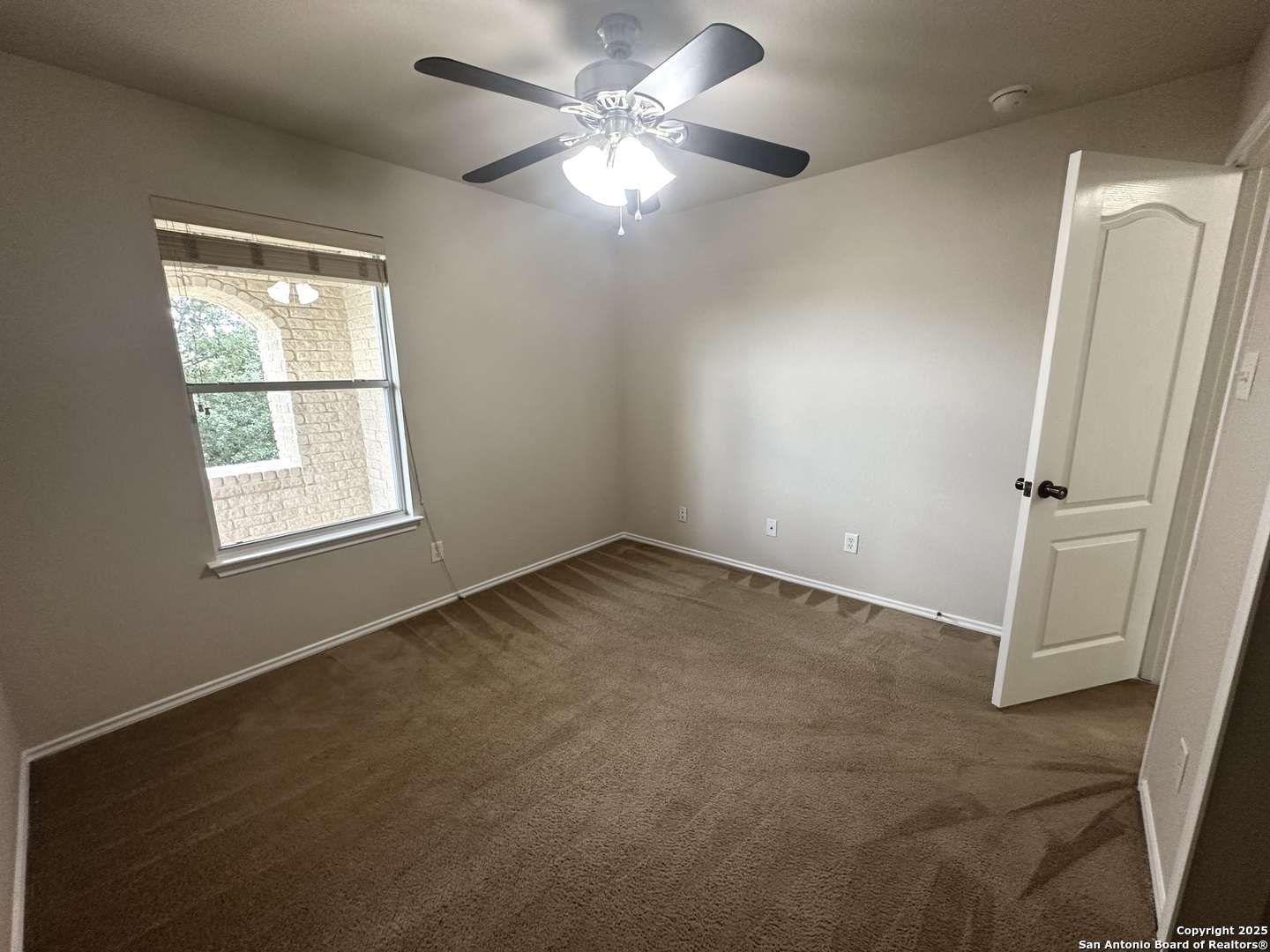 6741 Wayman Ridge Live Oak, TX 78233 - Photo 18 of 25 a view of an empty room with a window