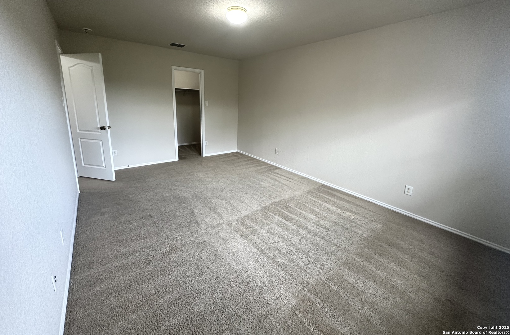 6741 Wayman Ridge Live Oak, TX 78233 - Photo 20 of 25 an empty room with a natural light