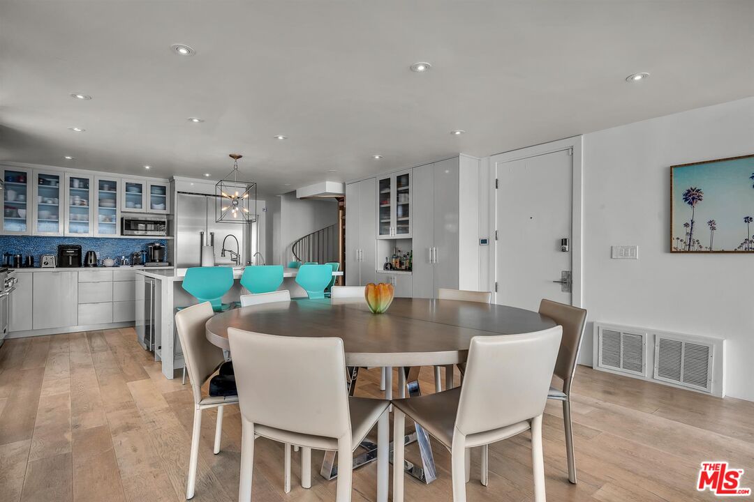5515 Pacific Avenue, Unit 1 Marina del Rey, CA 90292 - Photo 16 of 45 a view of a dining room with furniture and wooden floor