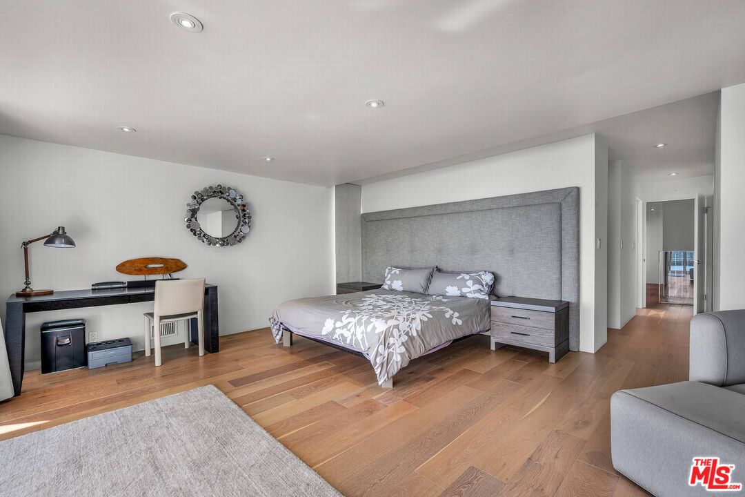 5515 Pacific Avenue, Unit 1 Marina del Rey, CA 90292 - Photo 33 of 45 a bedroom with furniture and a wooden floor