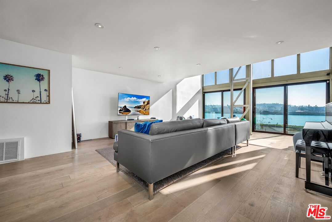 5515 Pacific Avenue, Unit 1 Marina del Rey, CA 90292 - Photo 10 of 45 a living room with furniture and a large window