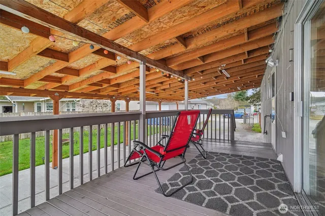 a view of a chairs in wooden deck
