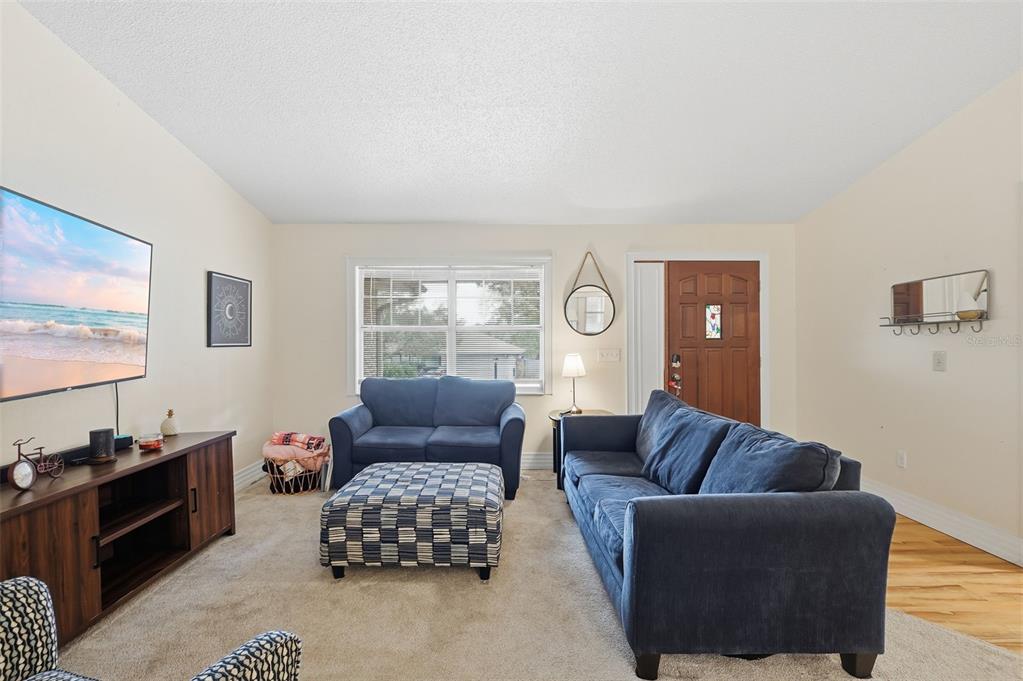 244 Angeles Road DeBary, FL 32713 - Photo 9 of 41 a living room with furniture rug and window