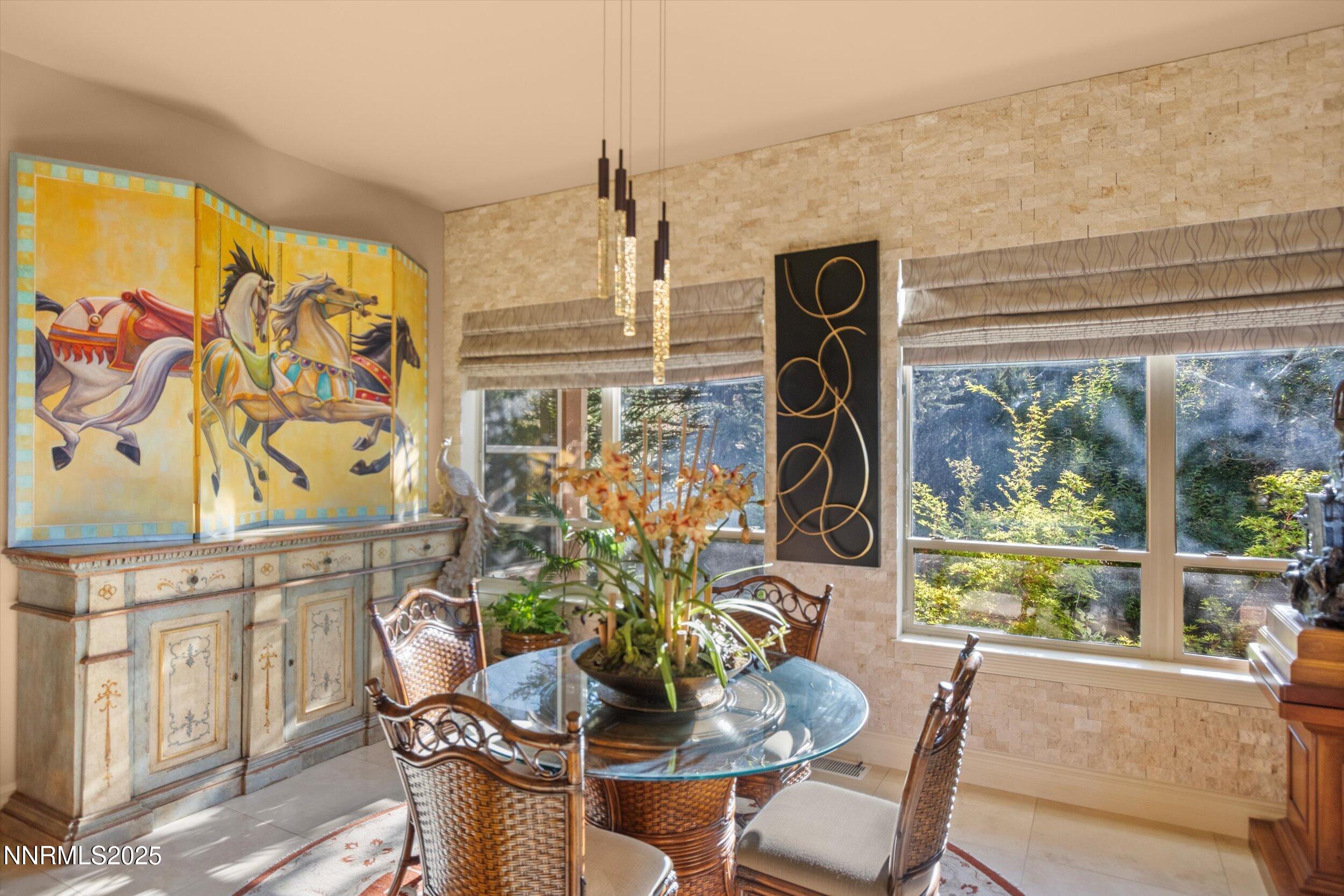 10411 Copper Cloud Drive Reno, NV 89511 - Photo 14 of 54 a dining room with furniture and window