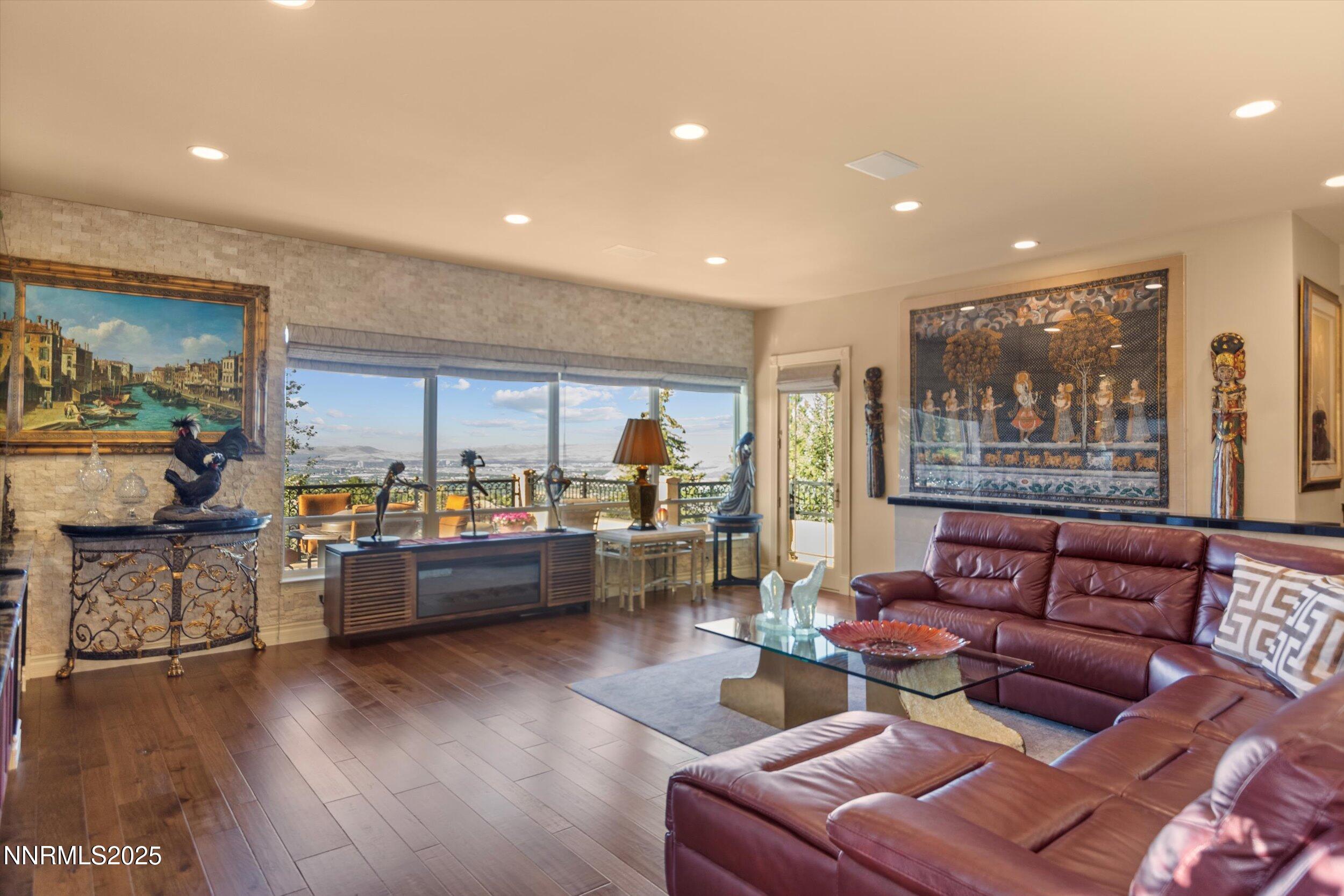 10411 Copper Cloud Drive Reno, NV 89511 - Photo 16 of 54 a living room with furniture and a large window