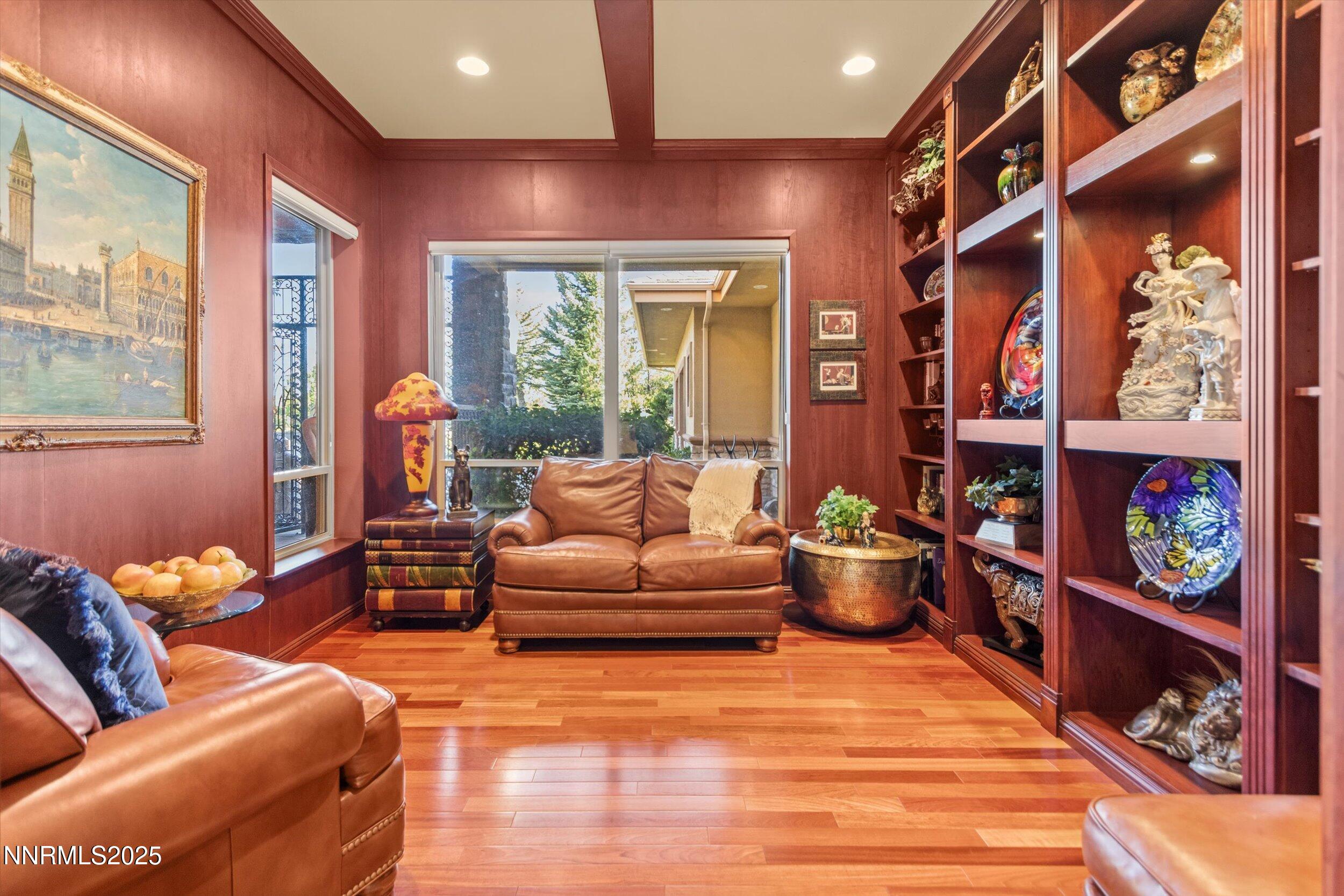 10411 Copper Cloud Drive Reno, NV 89511 - Photo 17 of 54 a living room with furniture and a book shelf