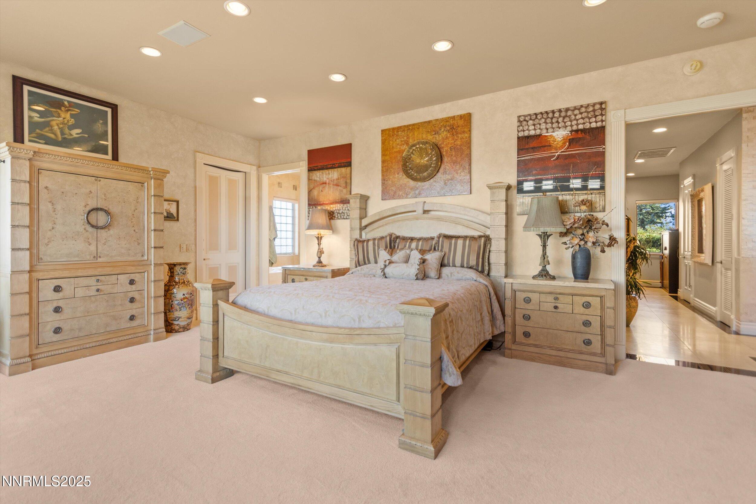 10411 Copper Cloud Drive Reno, NV 89511 - Photo 27 of 54 a bed room with a bed and furniture