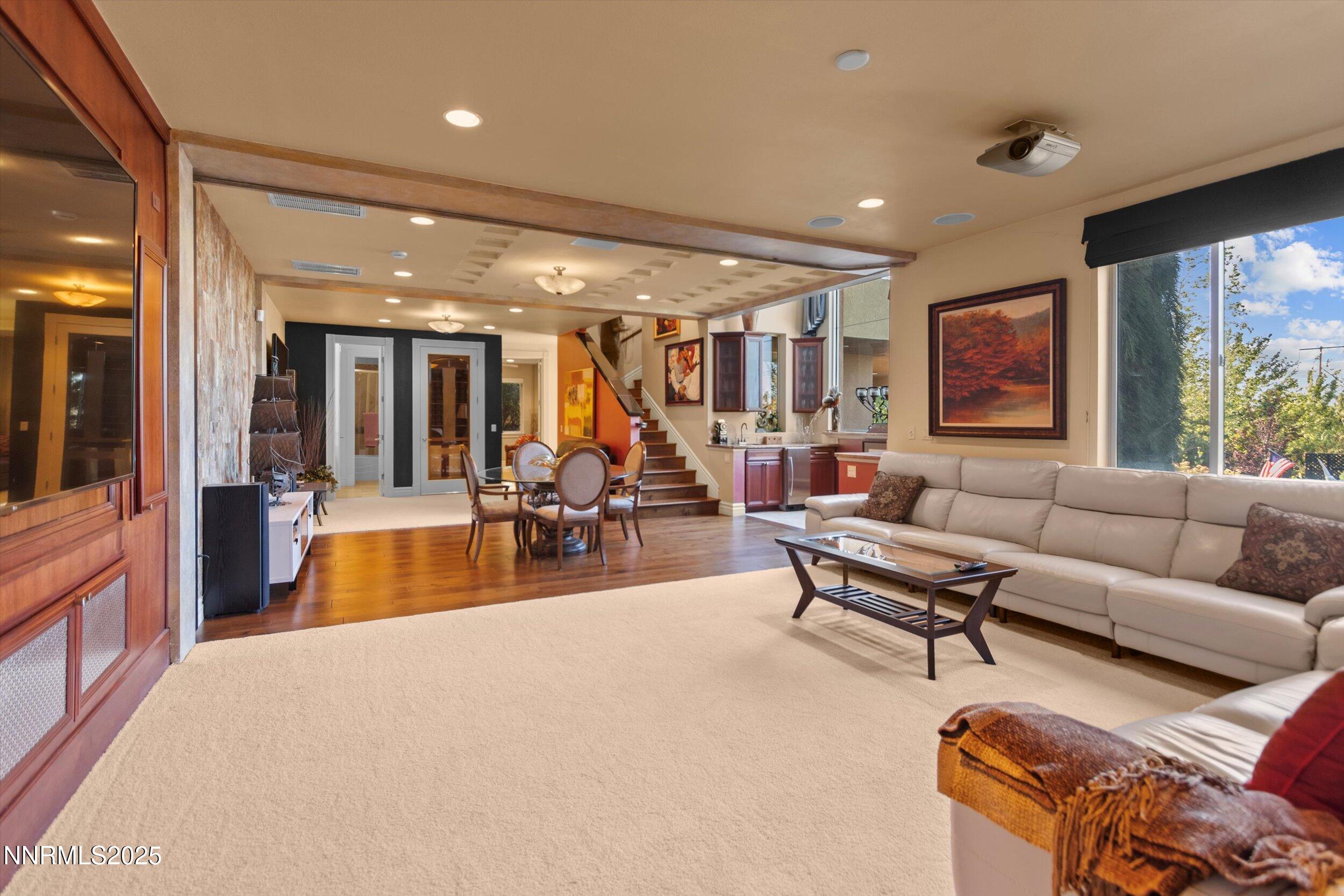 10411 Copper Cloud Drive Reno, NV 89511 - Photo 33 of 54 a living room with furniture and a large window