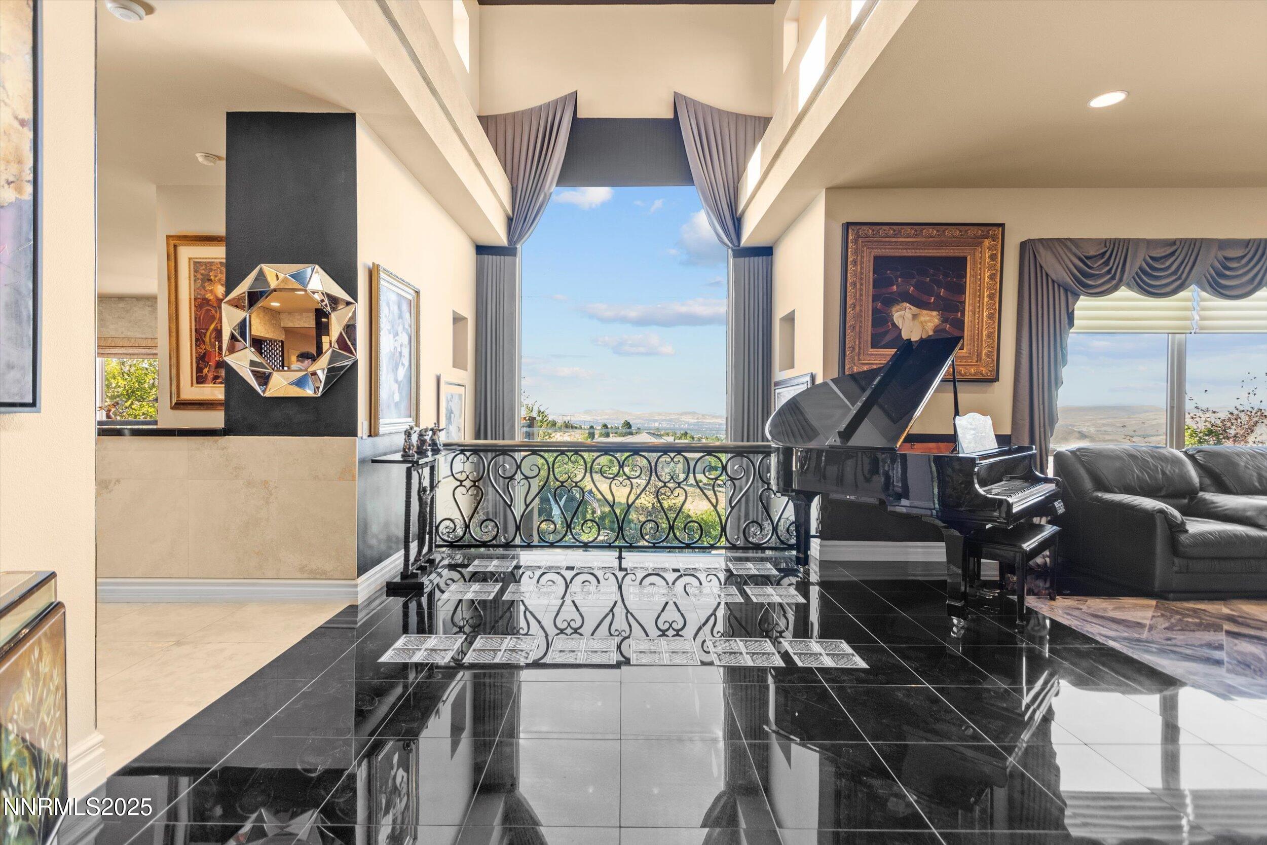 10411 Copper Cloud Drive Reno, NV 89511 - Photo 5 of 54 a view of entryway and hall with wooden floor