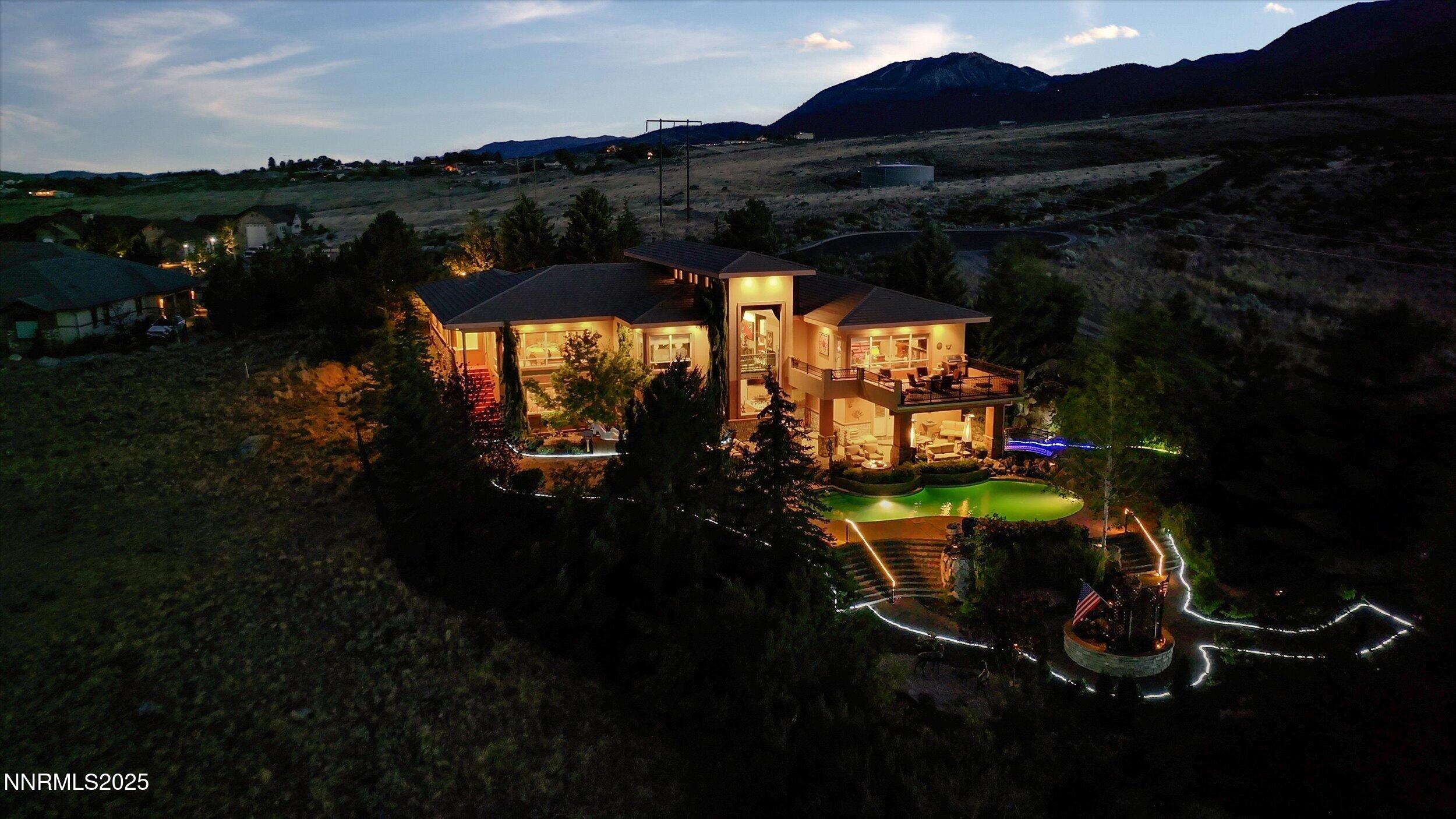 10411 Copper Cloud Drive Reno, NV 89511 - Photo 53 of 54 a view of a chairs and table in the patio