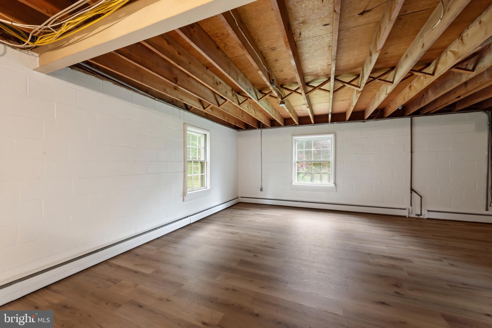 13409 Cambria Farms Road Phoenix, MD 21131 - Photo 44 of 54 a view of room with window and wooden floor