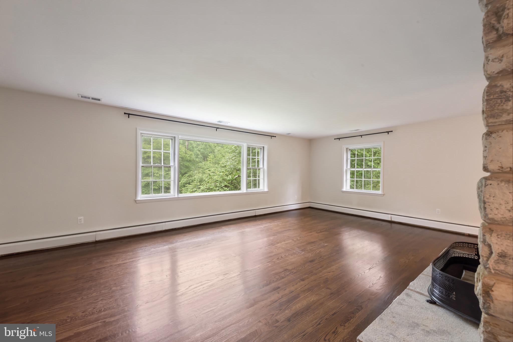 13409 Cambria Farms Road Phoenix, MD 21131 - Photo 10 of 54 a view of a room with wooden floor and a window