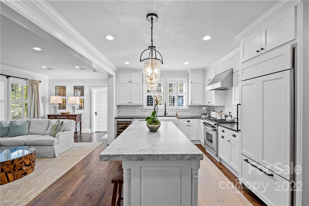 2156 Colony Road Charlotte, NC 28209 - Photo 13 of 46 a kitchen with stainless steel appliances granite countertop a sink stove and refrigerator