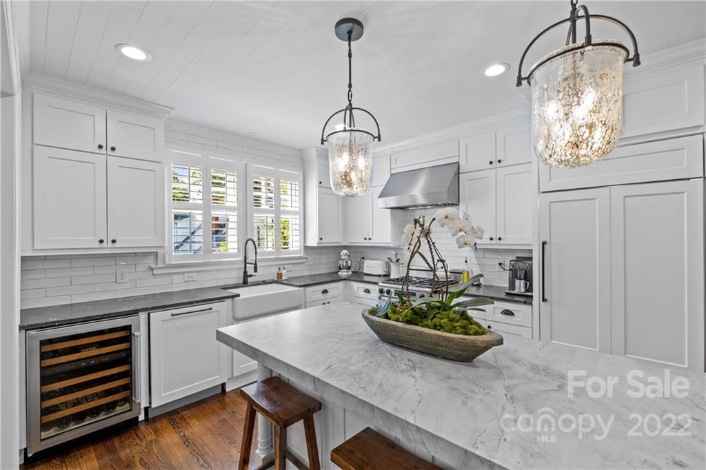 2156 Colony Road Charlotte, NC 28209 - Photo 19 of 46 a kitchen with sink and cabinets