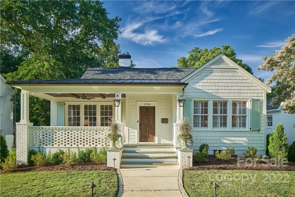 2156 Colony Road Charlotte, NC 28209 - Photo 2 of 46 front view of a house with a garden