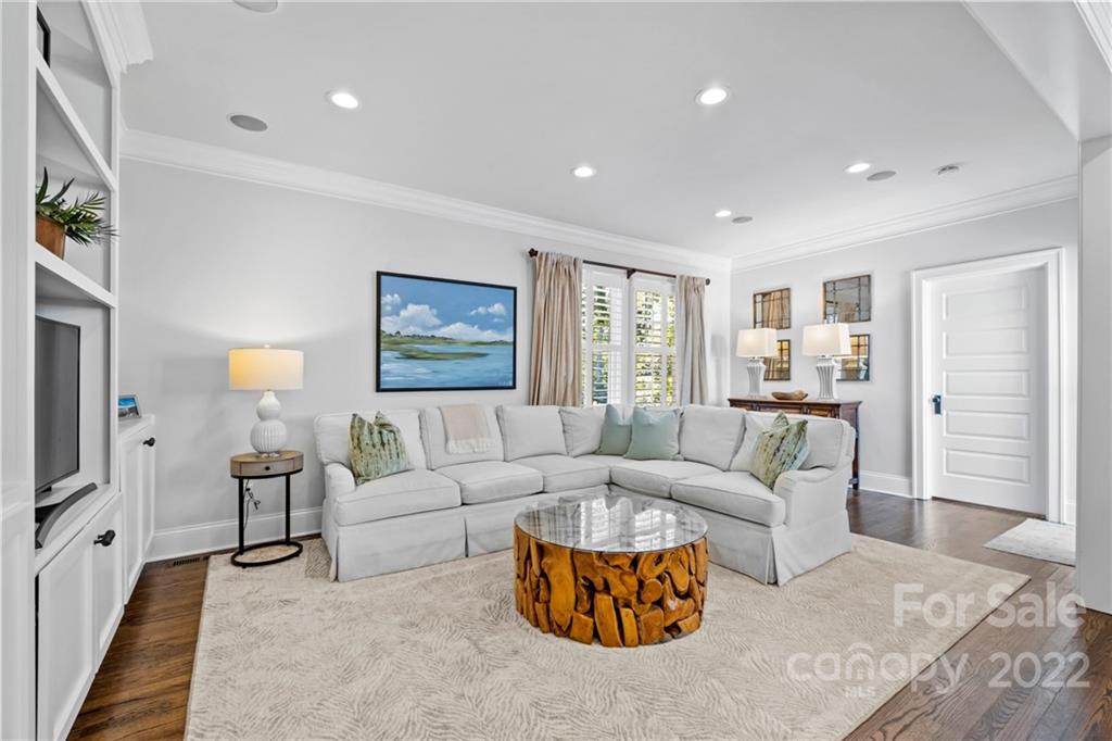 2156 Colony Road Charlotte, NC 28209 - Photo 24 of 46 a living room with furniture or couch and a flat screen tv