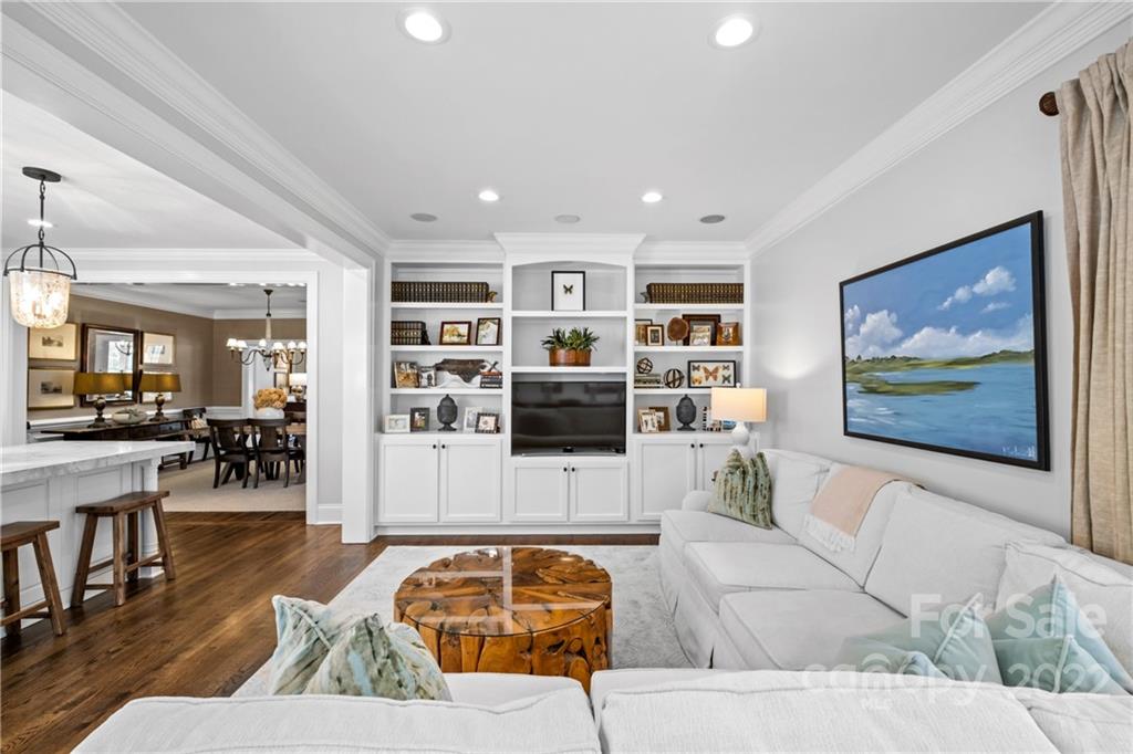 2156 Colony Road Charlotte, NC 28209 - Photo 25 of 46 a living room with furniture and wooden floor