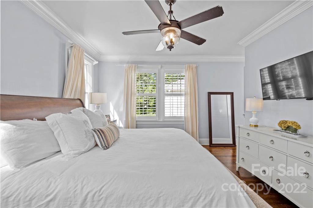 2156 Colony Road Charlotte, NC 28209 - Photo 27 of 46 a bedroom with a bed and a window