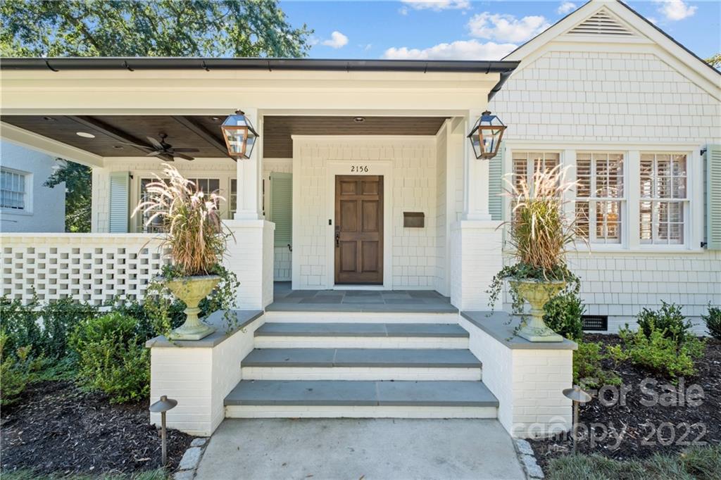 2156 Colony Road Charlotte, NC 28209 - Photo 3 of 46 a front view of a house with plants