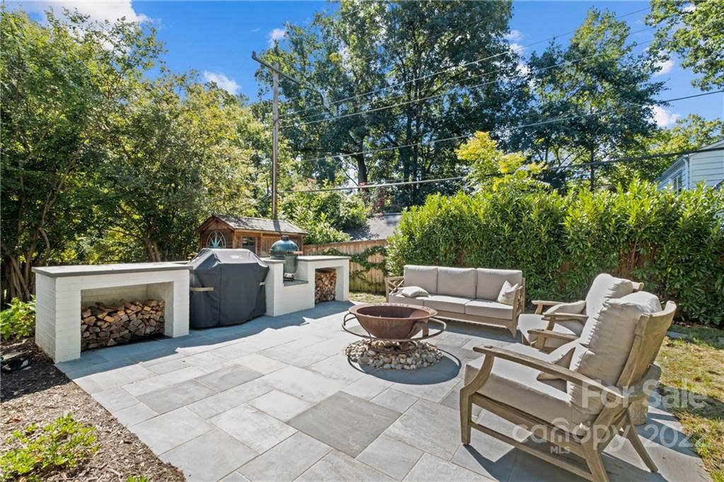 2156 Colony Road Charlotte, NC 28209 - Photo 41 of 46 a couch and a table in a patio