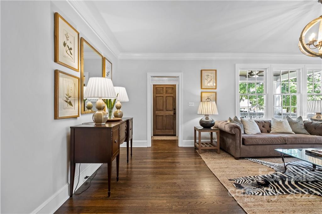 2156 Colony Road Charlotte, NC 28209 - Photo 5 of 46 a living room with furniture and wooden floor